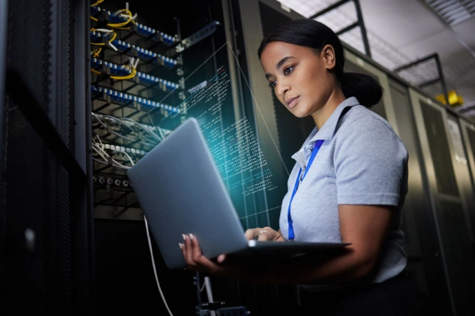 Female Working in server room