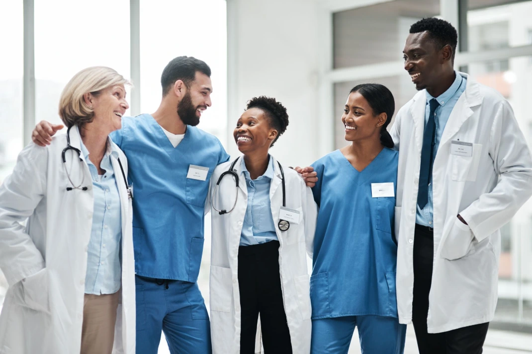 Multicultural healthcare medical team smiling Multicultural healthcare medical team smiling